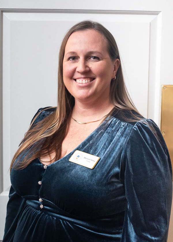 female wearing a blue shirt