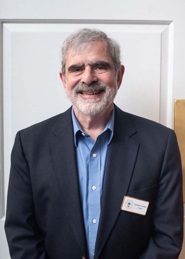 male wearing blue shirt and jacket