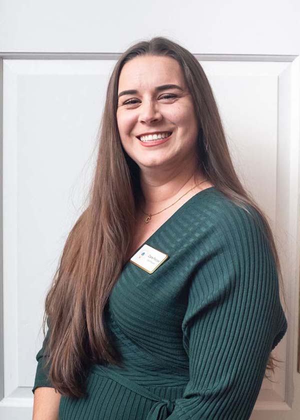 female wearing a green shirt